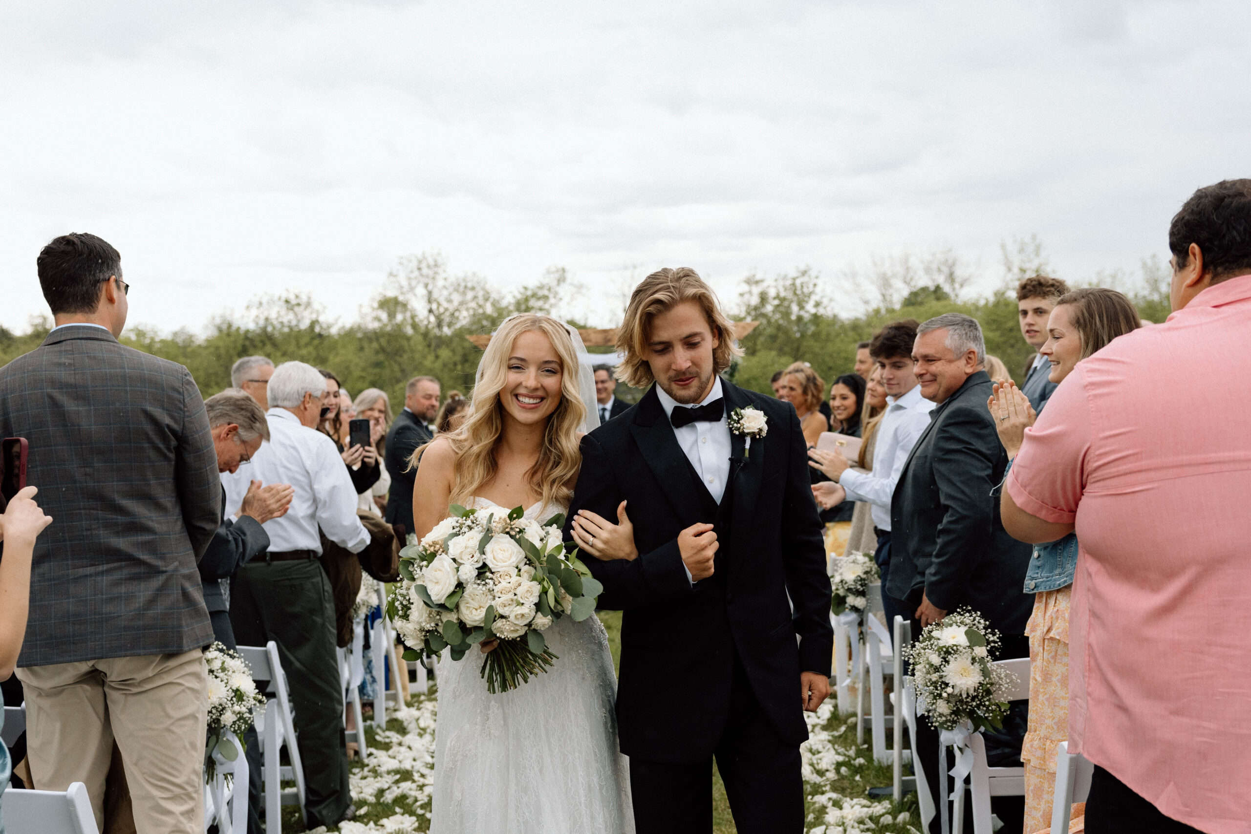 Joyful couple walk down the aisle at inexpensive wedding venue in Pennsylvania