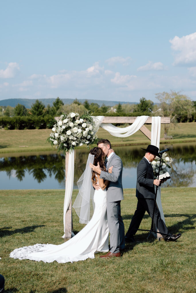 Bride and groom kiss after Pennsylvania wedding ceremony