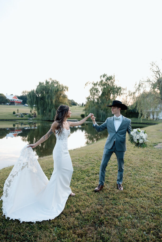 Bride and groom dance in rustic elegant outdoor setting