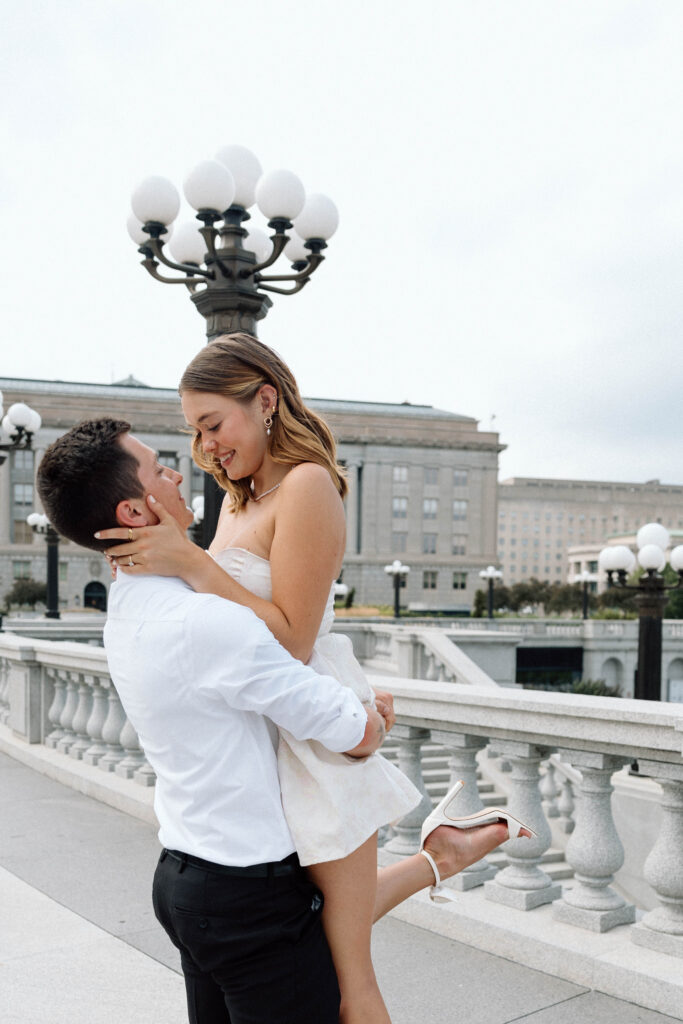 Couple spins and smiles on their engagement day luxury engagement photos