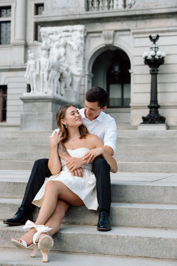 Engaged couple in bliss at the state capitol building