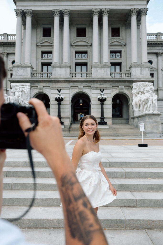 Photos in front of the state capitol building in Pennsylvania luxury engagement photos