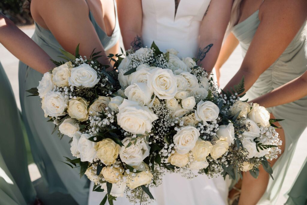 Closeup of all the bridesmaids flower bouquets together. 