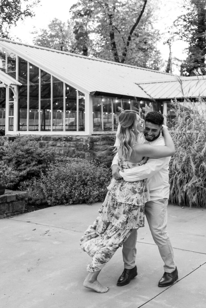 Couple dancing and laughing.