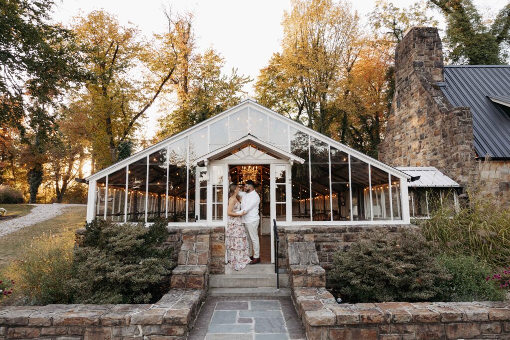 Engagement photoshoot in front of the greenhouse at Historic Shady Lane in Pennsylvania. 