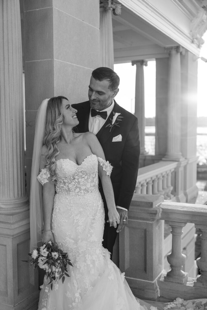 Bride and groom posing at King Mansion.