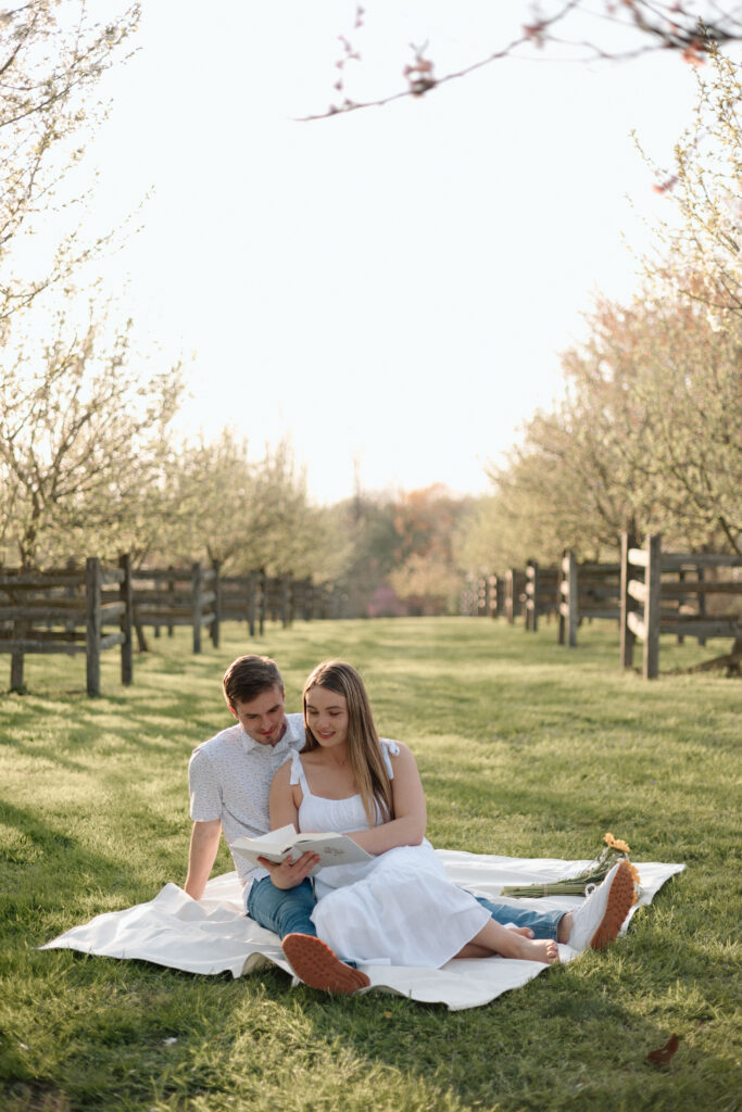 Engagement photo poses of a couple reading Scripture. 