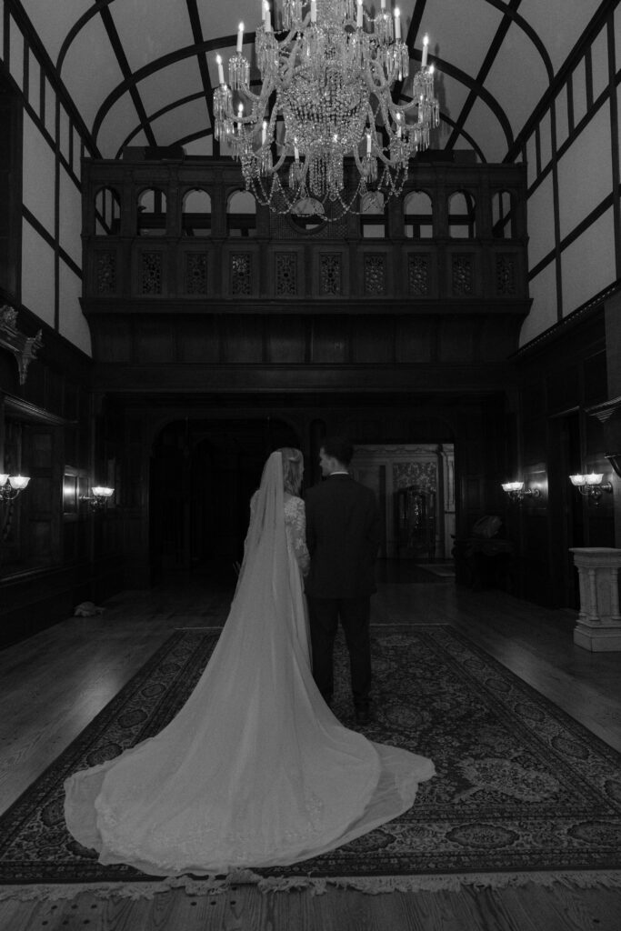 Dark and moody film wedding photo for how to pick a wedding photographer.
