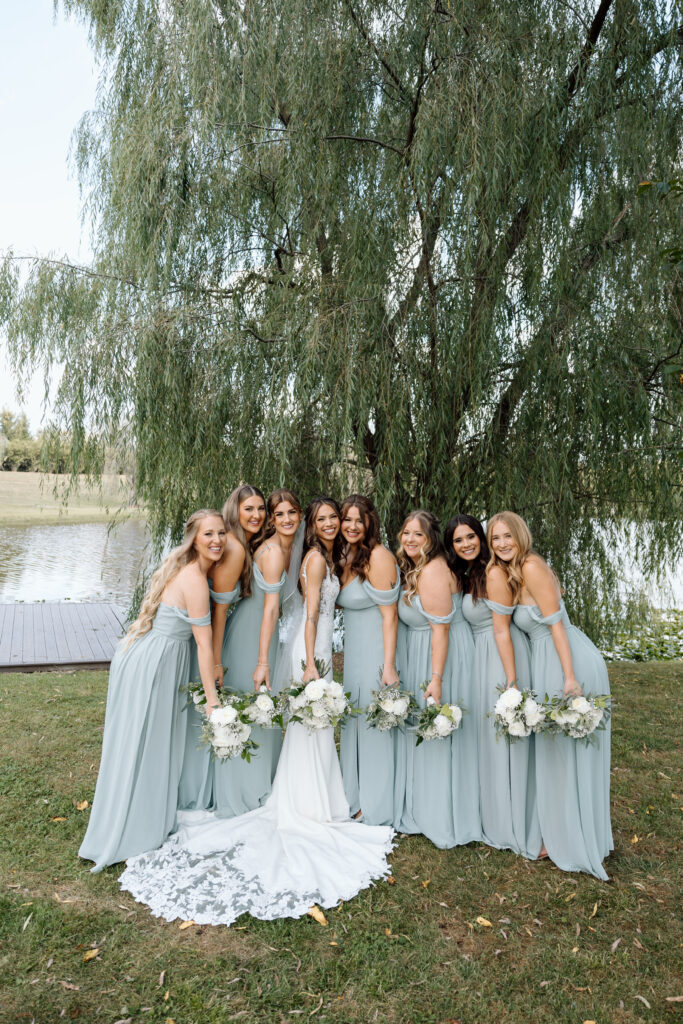 Bridal party smiling together at Wind in the Willows, one of the best Pennsylvania wedding venues.
