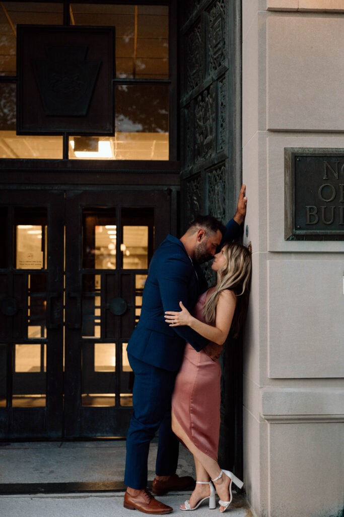 A couple showing what to wear for engagement pictures that are elegant and luxurious.