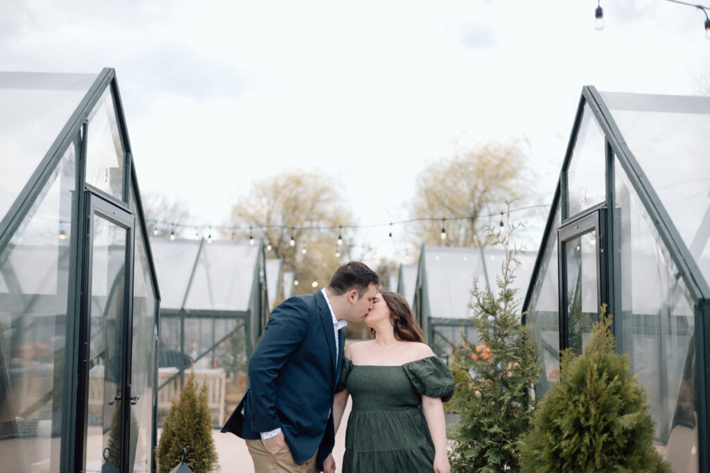 Couple kissing at a winery in Maryland.